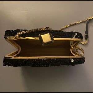 Black sequel cross body bag